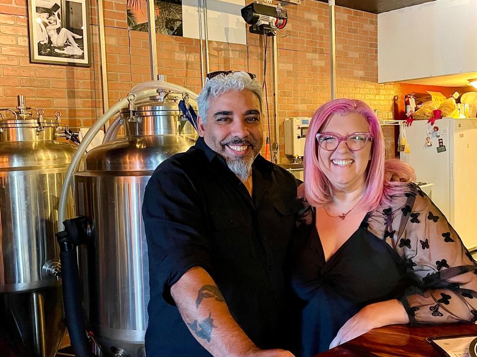 Owners JR and Mika Rivera inside Typsy Unicorn's Brewing in Edgewater.