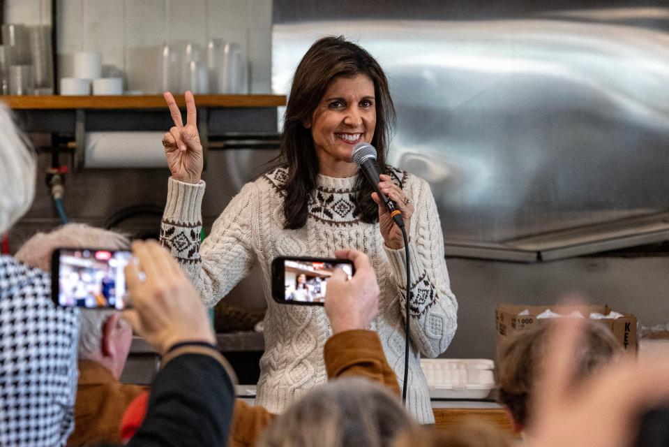 Republican presidential hopeful and former UN Ambassador Nikki Haley holds up two fingers as she speaks at Brown's Lobster Pound in Seabrook, New Hampshire, on January 21, 2024. Haley addressed the news of Florida Governor Ron DeSantis dropping out of the race, gesturing to indicate that it is now a two person race.