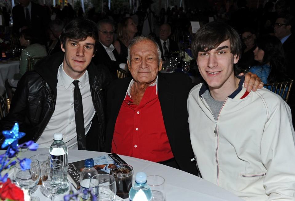 Hef with sons Cooper and Marston. Getty Images