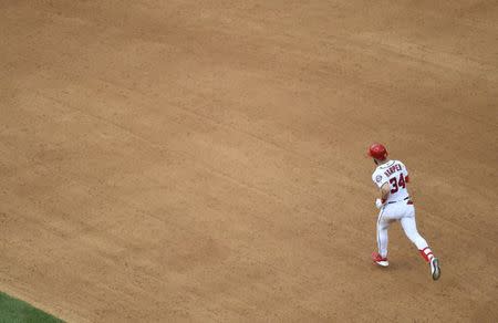 Jun 9, 2018; Washington, DC, USA; Washington Nationals center fielder Bryce Harper (34) rounds the bases after hitting a solo homer against the San Francisco Giants during the fourth inning at Nationals Park. Mandatory Credit: Brad Mills-USA TODAY Sports