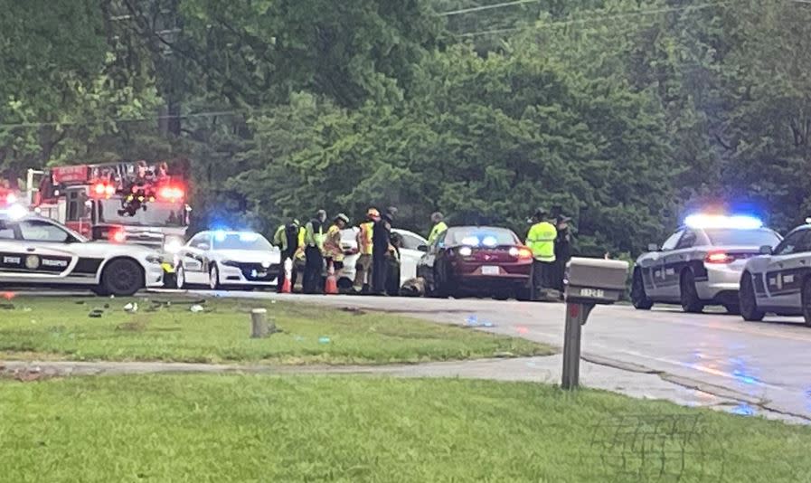 First responders in Six Forks Road after the wreck north of Raleigh happened along a two-lane section of Six Forks Road about a half mile north of Durant Road at Hartland Court. Photo by Amalia Roy/CBS 17