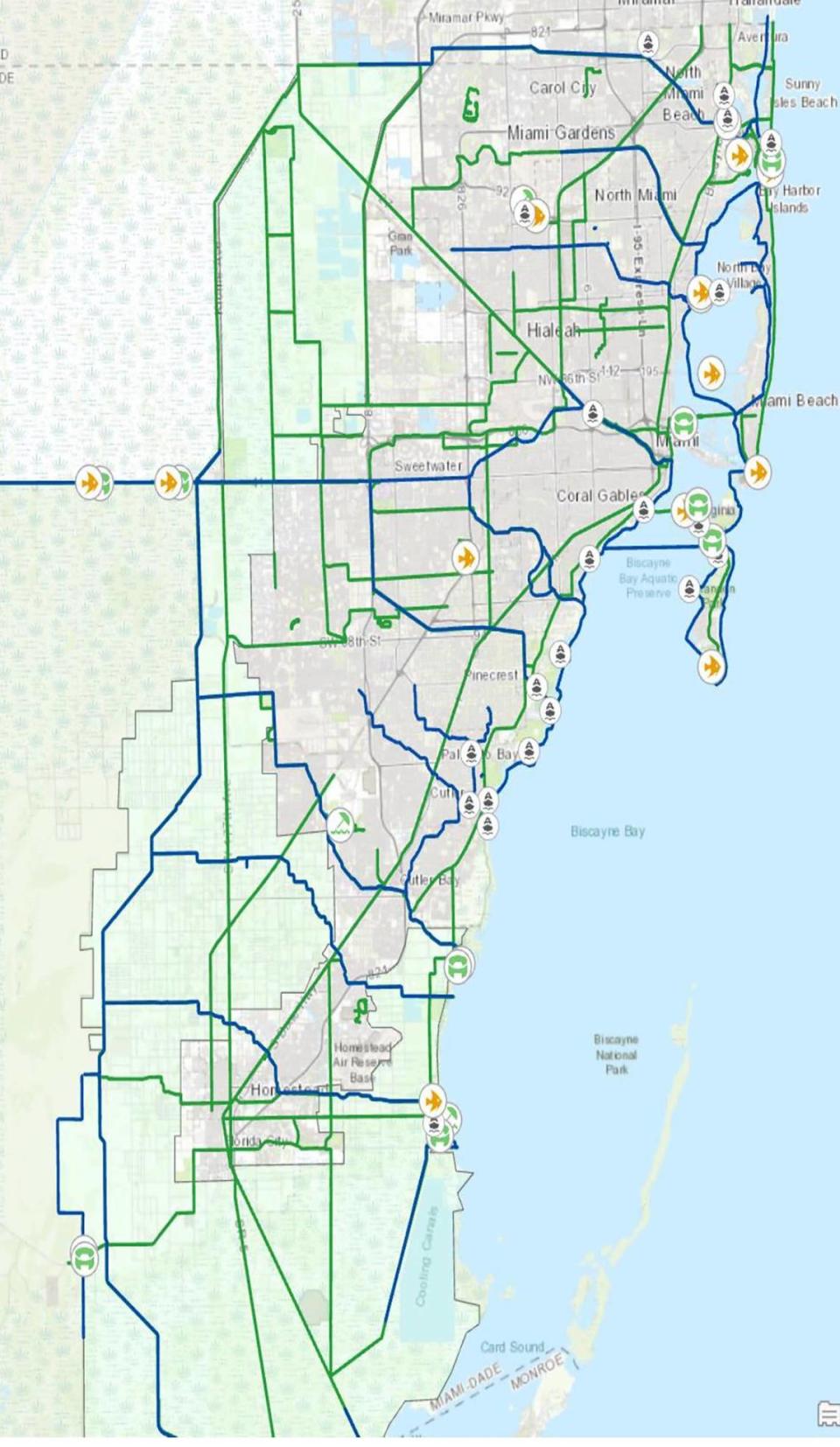 This map of Miami-Dade County shows the existing canal system in blue and a planned network of interconnecting bicycle trails in green.