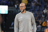 Phoenix Suns head coach Monty Williams, calls to his team in the second half of an NBA basketball game against the Memphis Grizzlies, Friday, Nov. 12, 2021, in Memphis, Tenn. (AP Photo/Karen Pulfer Focht)