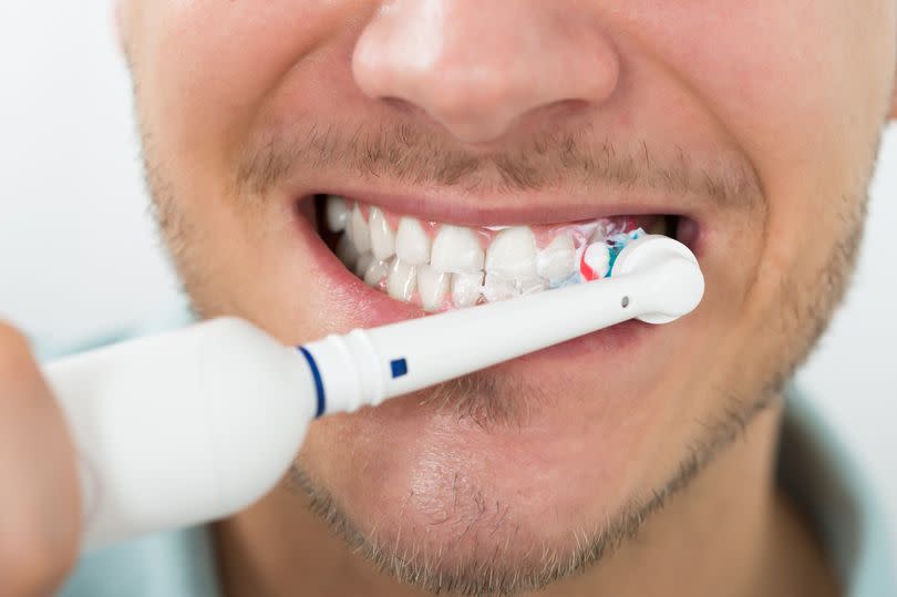 A dentist has explained how you can stop your teeth going yellow