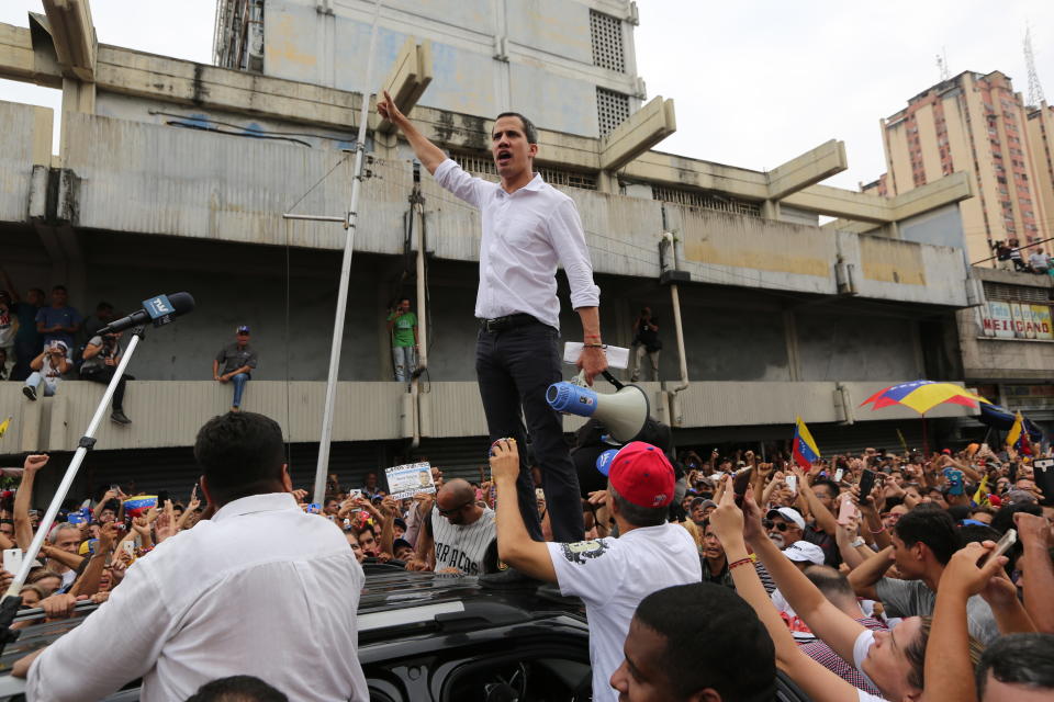 Venezuela's opposition leader and self proclaimed president Juan Guaido, speaks to the crowd during a rally in Maracay, Venezuela, Friday, April 26, 2019. The Trump administration has added Venezuelan Foreign Minister Jorge Arreaza to a Treasury Department sanctions target list as it increases pressure on Guaido's opponent, embattled President Nicolas Maduro. (AP Photo/Fernando Llano)