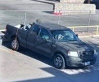 An El Paso mother, Jennifer Carmony, was last seen driving this Ford F150, seen in a security camera image, that was originally red but has been spray-painted black with a possible Texas license plate of BE88718. An Amber Alert was issued for the missing family on Saturday.