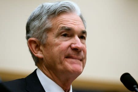 FILE PHOTO: Federal Reserve Chairman Jerome Powell reacts to questioning by Rep. Sean Duffy, R-WI, during his testimony before a House Financial Services Committee hearing on the