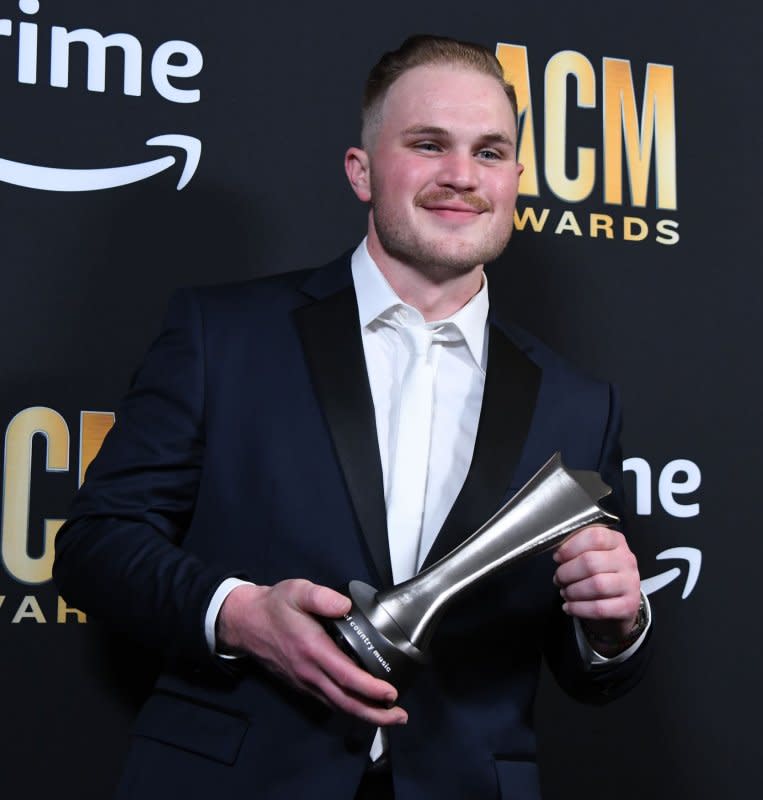 Zach Bryan shows his New Male Artist of the Year Award at the Academy of Country Music Awards at The Star in Frisco, Texas, on May 11, 2023. File Photo by Ian Halperin/UPI