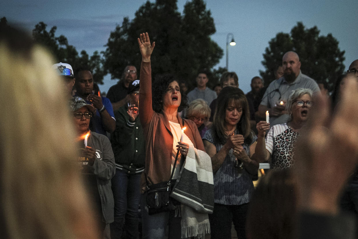 Image: Community members sing during a prayer vigil at Hills Church, on May 15, 2023, in Farmington, N.M. (Susan Montoya Bryan / AP)