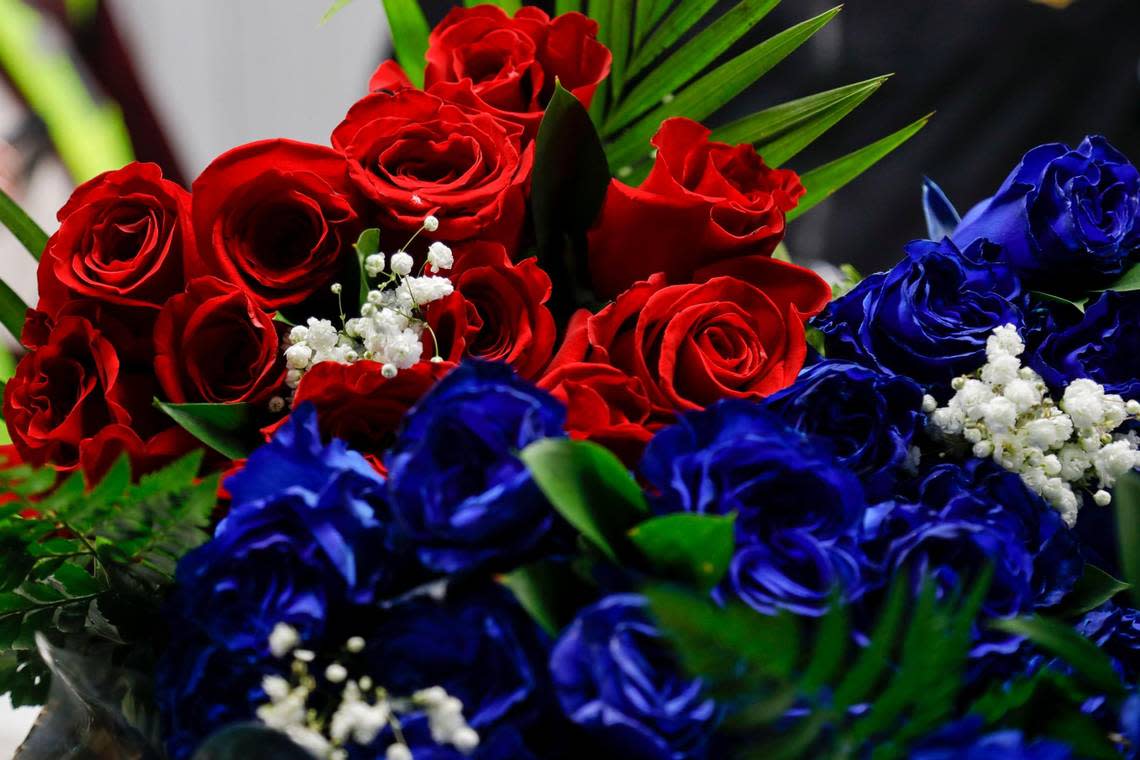 Red and blue roses await to be inspected for harmful pests by agriculture specialists from U.S. Customs and Border Protection at Miami International Airport on Monday, Feb. 6, 2023.