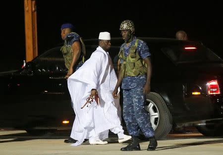 Former Gambian President Yahya Jammeh arrives at the airport before flying into exile from Gambia, January 21, 2017. REUTERS/Thierry Gouegnon