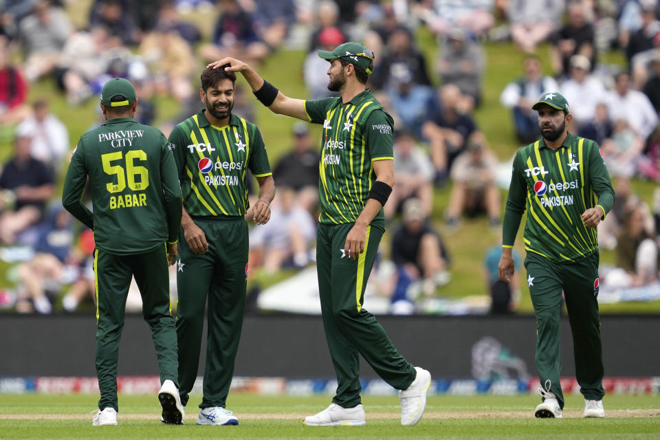 Palistan's players celebrate the wicked to of New Zealand's Devon Conway during their T20international cricket match in Dunedin, New Zealand, Wednesday, Jan. 17, 2024. (Michael Thomas/Photosport via AP)