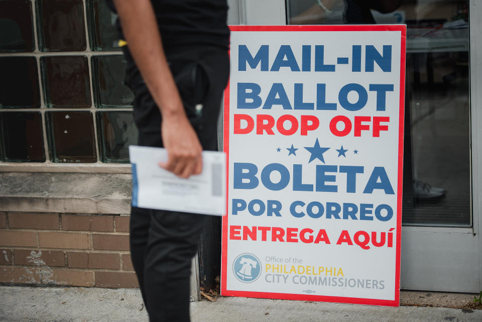 A voter waits to drop off his mail-in ballot at West Oak Lane Library in Philadelphia, Pennsylvania, U.S., on on June 2, 2020. (Hannah Yoon/Bloombergvia Getty Images)