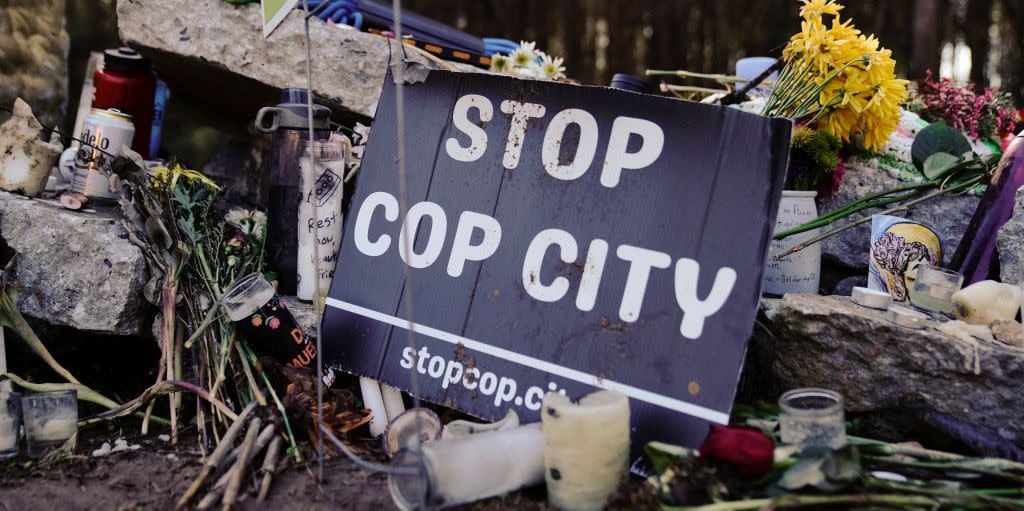 a sign that reads stop cop city