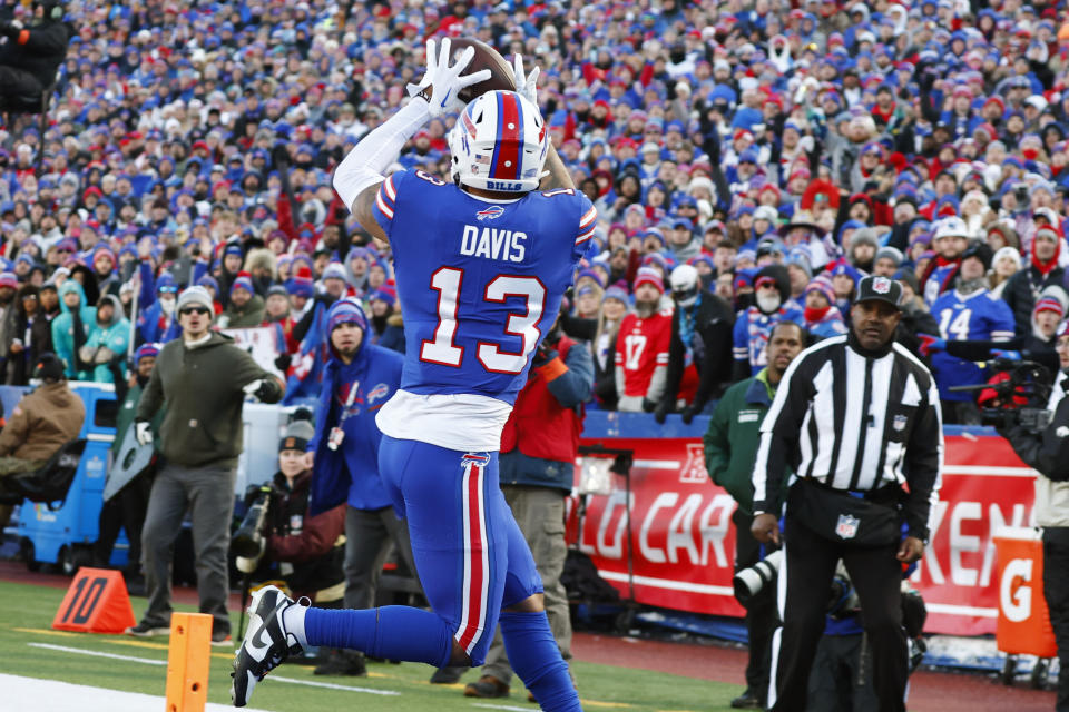 Buffalo Bills wide receiver Gabe Davis (13) grabs a touchdown pass during the second half of an NFL wild-card playoff football game against the Miami Dolphins, Sunday, Jan. 15, 2023, in Orchard Park, N.Y. (AP Photo/Jeffrey T. Barnes)