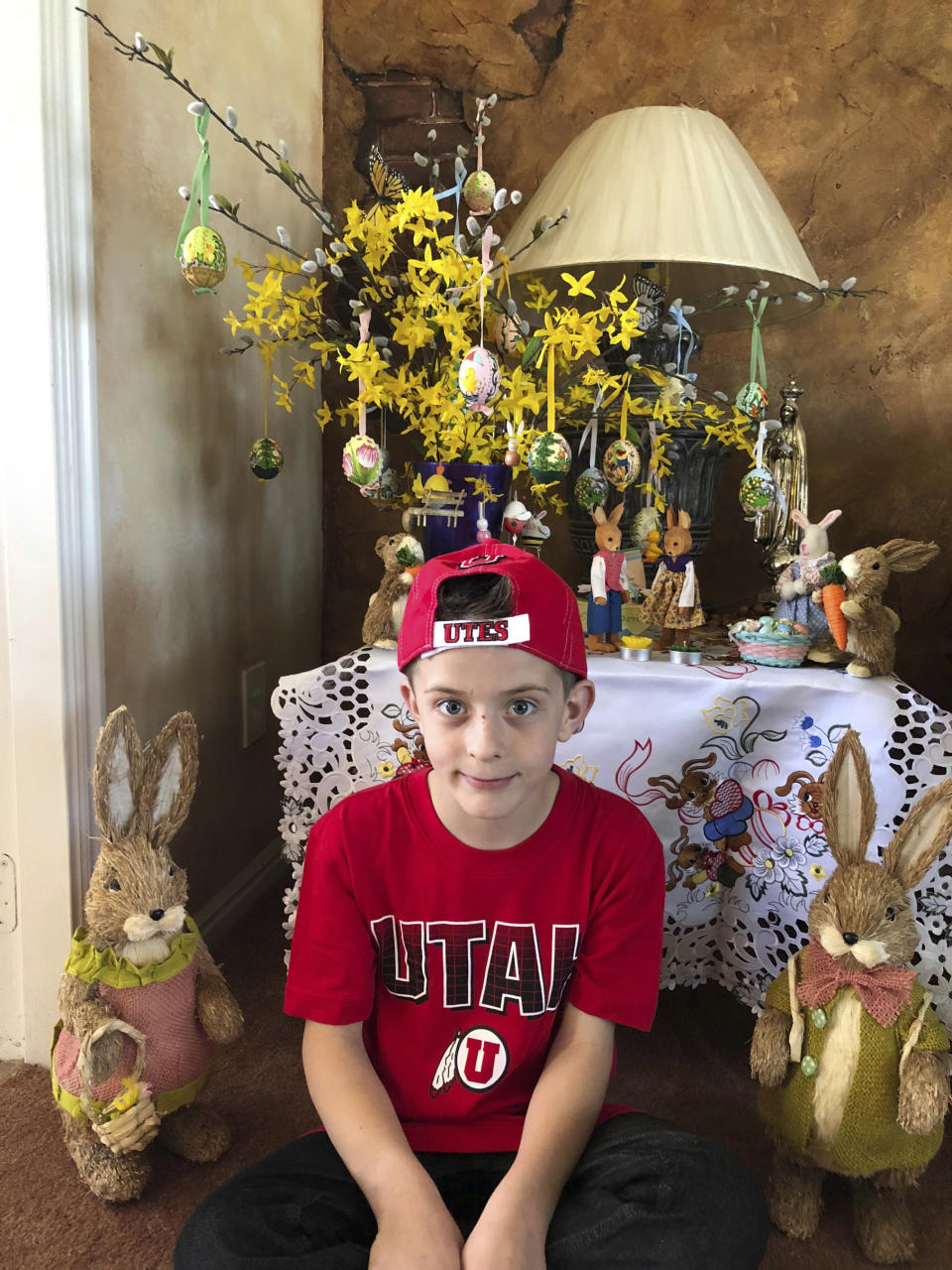 This April 1, 2018 photo provided by Karen Fisher shows fourth-grader William McLeod at his home in Bountiful, Utah. A teacher in the predominantly Mormon state was placed on administrative leave Thursday, March 7, 2019 after she forced McLeod, a Catholic student to wash off the Ash Wednesday cross from his forehead. (Karen Fisher via AP)