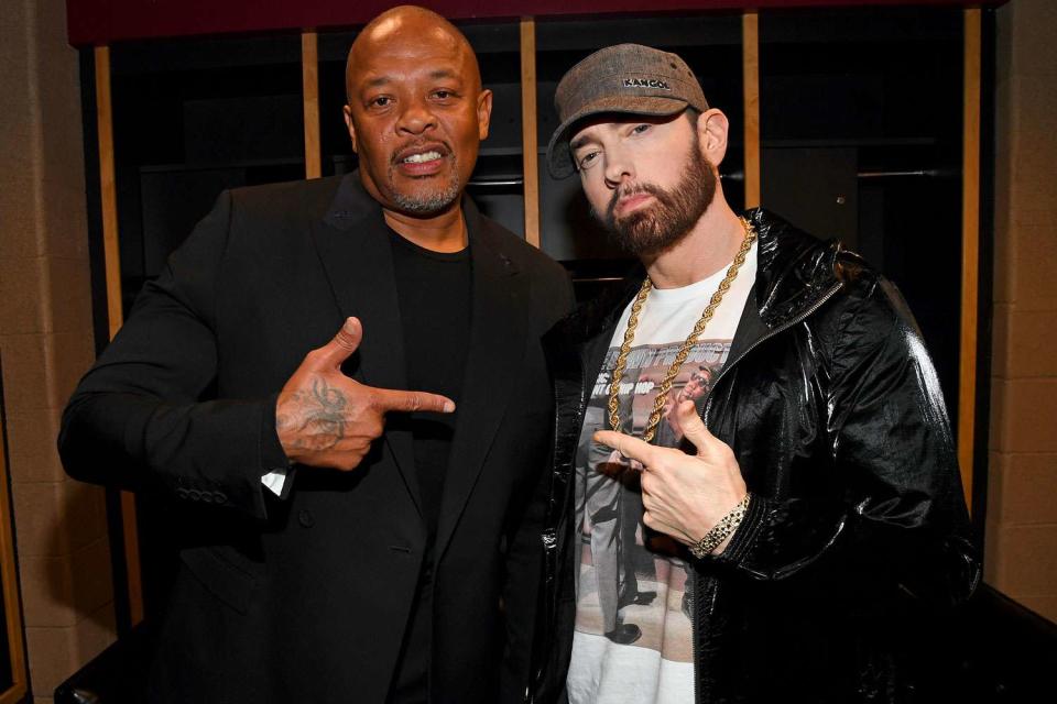 <p>Kevin Mazur/Getty</p> Dr. Dre and Eminem