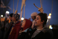 Activists protest outside of the COP25 climate talks congress in Madrid, Spain, Saturday, Dec. 14, 2019. The United Nations Secretary-General has warned that failure to tackle global warming could result in economic disaster. (AP Photo/Manu Fernandez)