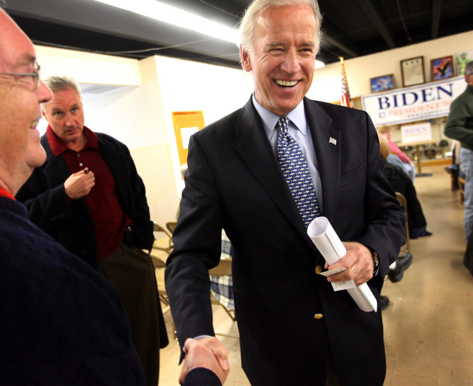 Democratic Presidential hopeful Sen. Biden (D-Del.) greets potential supporters at a VFW hall on Dec. 2, 2007, in Des Moines, Iowa.