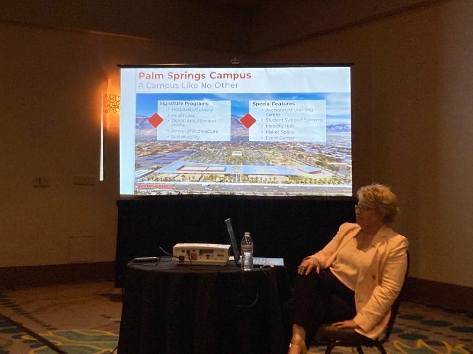 A slide showing a rendering of College of the Desert's planned Roadrunner Motors campus in Cathedral City is shown during a presentation to the community at the Hilton hotel in Palm Springs on Oct. 4, 2023.