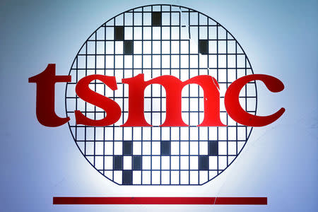 FILE PHOTO: The logo of Taiwan Semiconductor Manufacturing Company (TSMC) is seen during an investors' conference in Taipei, Taiwan, April 13, 2017. REUTERS/Tyrone Siu/File Photo