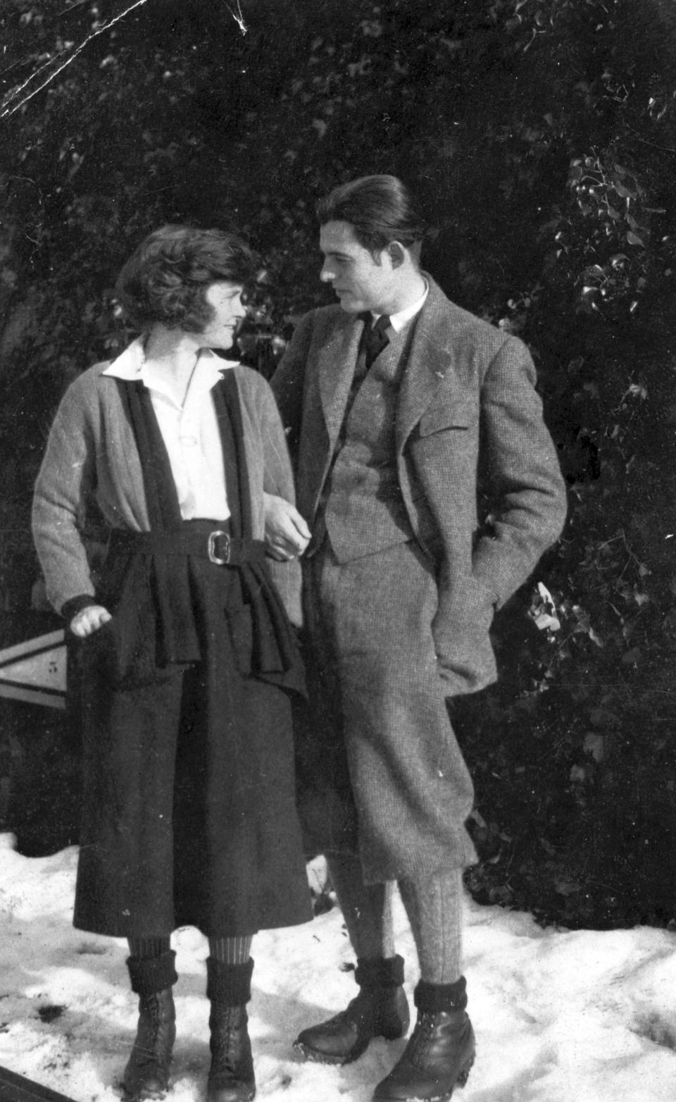 In this 1922 photo provided by the John F. Kennedy Library Foundation from the Ernest Hemingway Collection Ernest Hemingway stands with his first wife Hadley Hemingway in Chamby, Switzerland. A new three-part documentary about Hemingway, which relied heavily on the archives at the John F. Kennedy Presidential Library and Museum in Boston, debuts April 5, 2021, on PBS. (John F. Kennedy Presidential Library and Museum, Boston via AP)