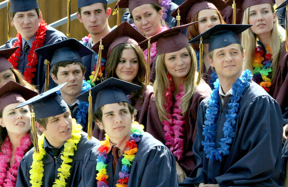 the cast of the OC at graduation