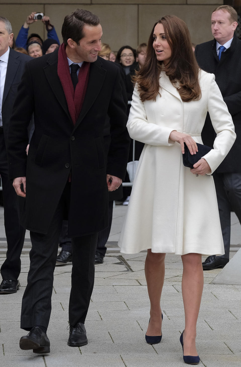 <p>Kate wore another Max Mara coat - this time, in stark white - for a Portsmouth engagement. As before, she paired the look with Jimmy Choos and a suede L.K. Bennett clutch. </p><p><i>[Photo: PA]</i></p>