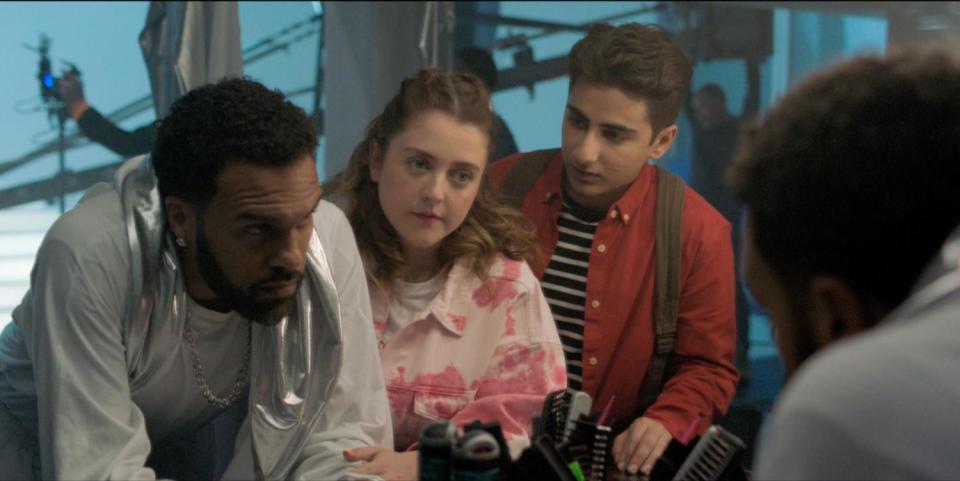 O-T Fagbenle, Helen Monks and Alan Asaad in a scene from Hulu comedy "Maxxx."