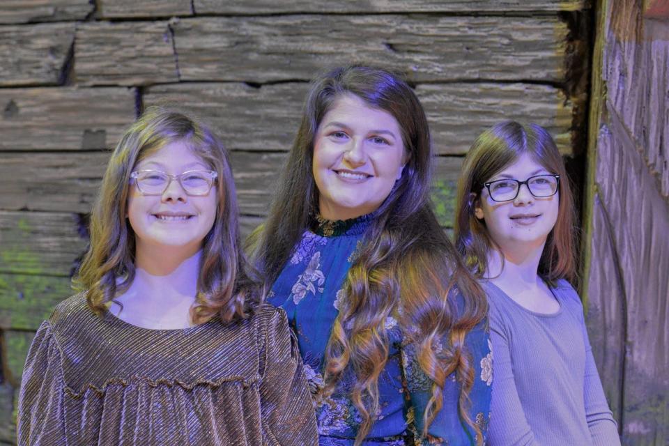 The Crazy Hair Tour will open the door for conversations about tough teen issues for Amanda Chaney, center, and her daughters Elise Chaney, left, and Amelia Chaney.