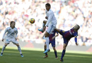 <p>Barcelona’s Andres Iniesta, right, fights for the ball with Real Madrid’s Raphael Varene during the Spanish La Liga soccer match between Real Madrid and Barcelona at the Santiago Bernabeu stadium in Madrid, Spain, Saturday, Dec. 23, 2017. (AP Photo/Francisco Seco) </p>