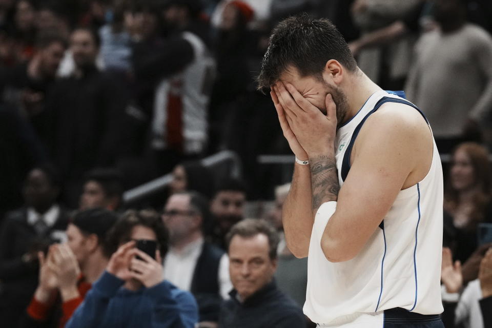 Dallas Mavericks' Luka Doncic reacts after a turnover in possession with seconds left on the clock during his team's loss to the Toronto Raptors in NBA basketball game action in Toronto, Saturday, Nov. 26, 2022. (Chris Young/The Canadian Press via AP)