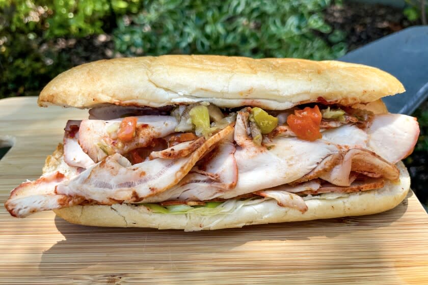 The roast pork sandwich at Perking Coffee House in Yorba Linda.