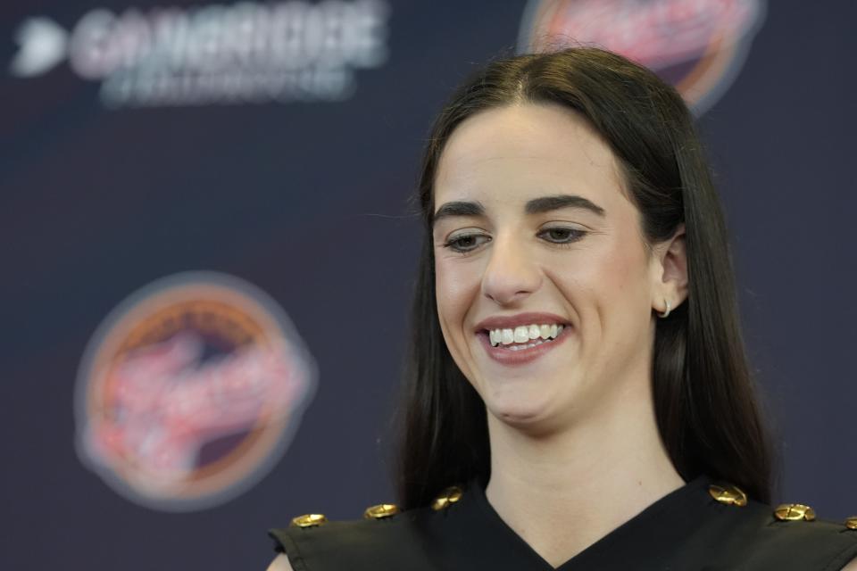 Indiana Fever's Caitlin Clark speaks during a WNBA basketball news conference, Wednesday, April 17, 2024, in Indianapolis. (AP Photo/Darron Cummings)