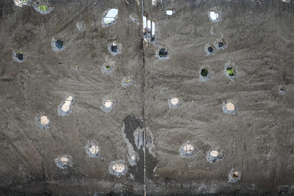 Holes on a wall that has been damaged after a Russian missile strike in Odesa (AFP via Getty Images)