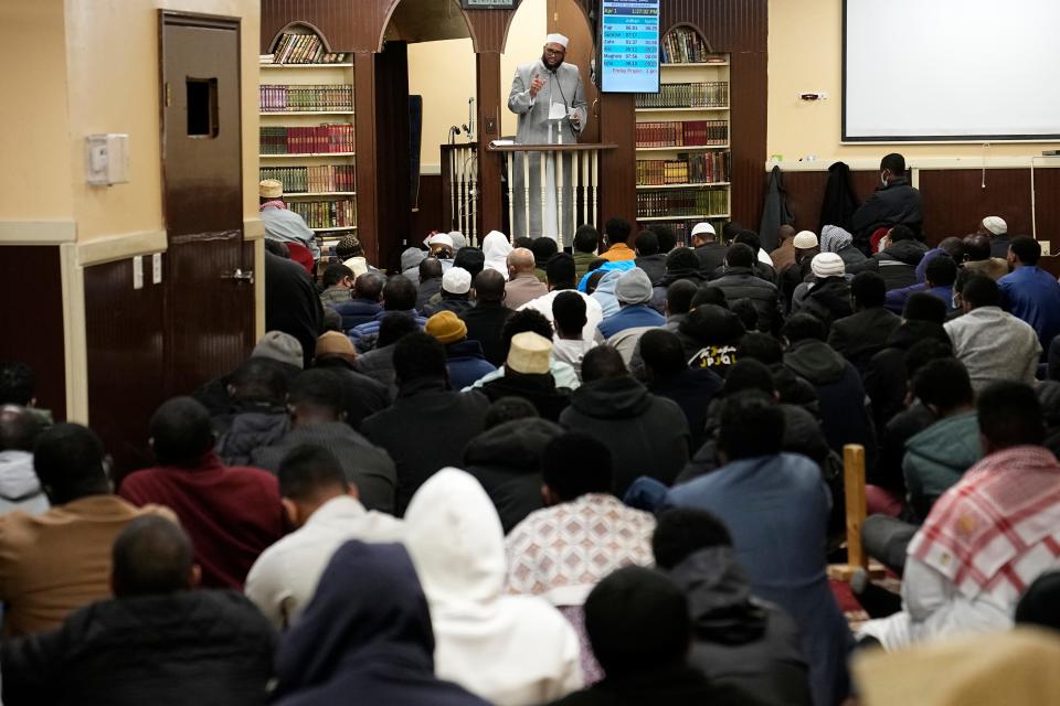 Imam Farhan Ali leads Masjid Abu Hurairah members during Friday prayer at the mosque in Columbus on April 1, 2022.