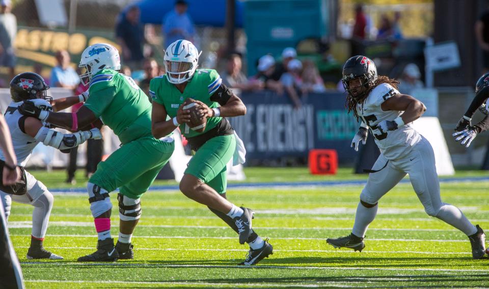 West Florida quarterback Peewee Jarrett runs down field Saturday, October 28, 2023 at Pen Air Field at the University of West Florida. Valdosta State beat UWF 31-28.