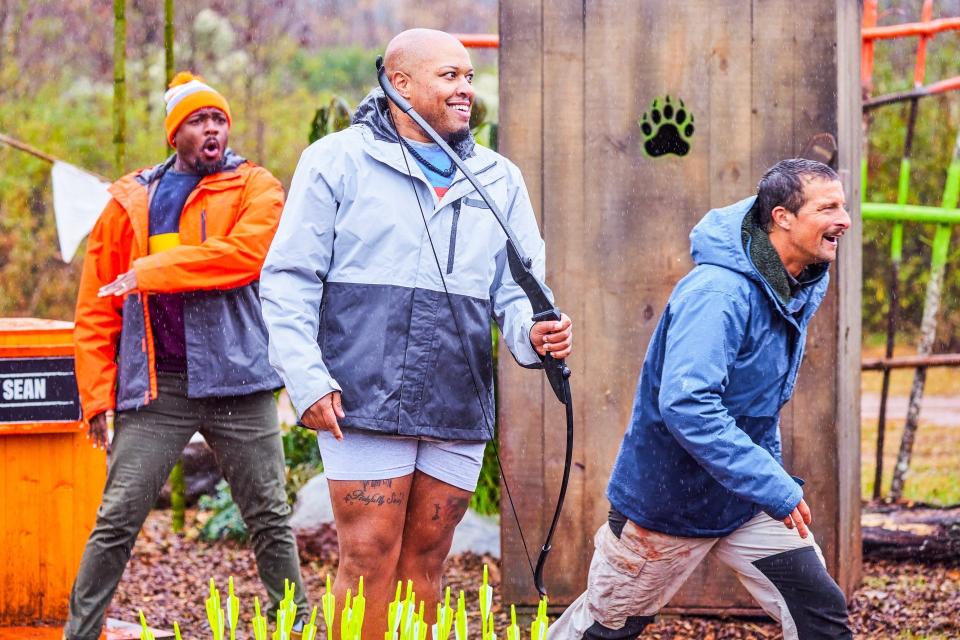 Indianapolis resident Sean Tucker (center) appears with survivalist Bear Grylls (right) on  the "I survived Bear Grylls" reality TV game show that airs on TBS.