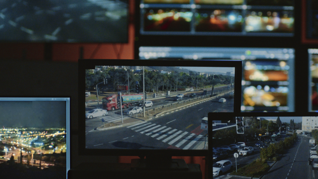 monitor displaying a traffic intersection