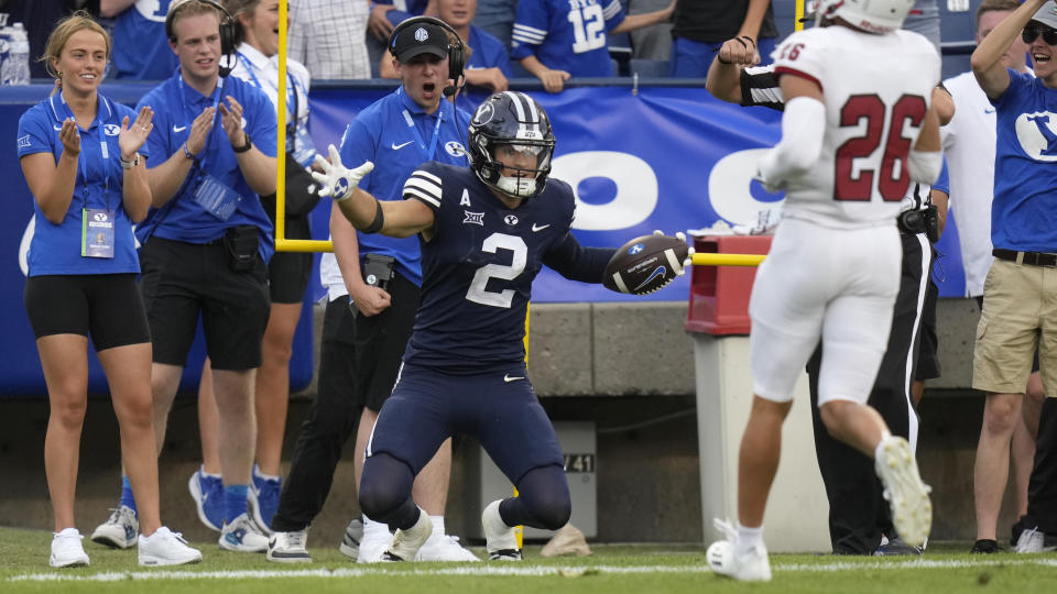 BYU wide receiver Chase Roberts (2) celebrates after scoring against Southern Utah during the second half of an NCAA college football game Saturday, Sept. 9, 2023, in Provo, Utah. (AP Photo/Rick Bowmer)