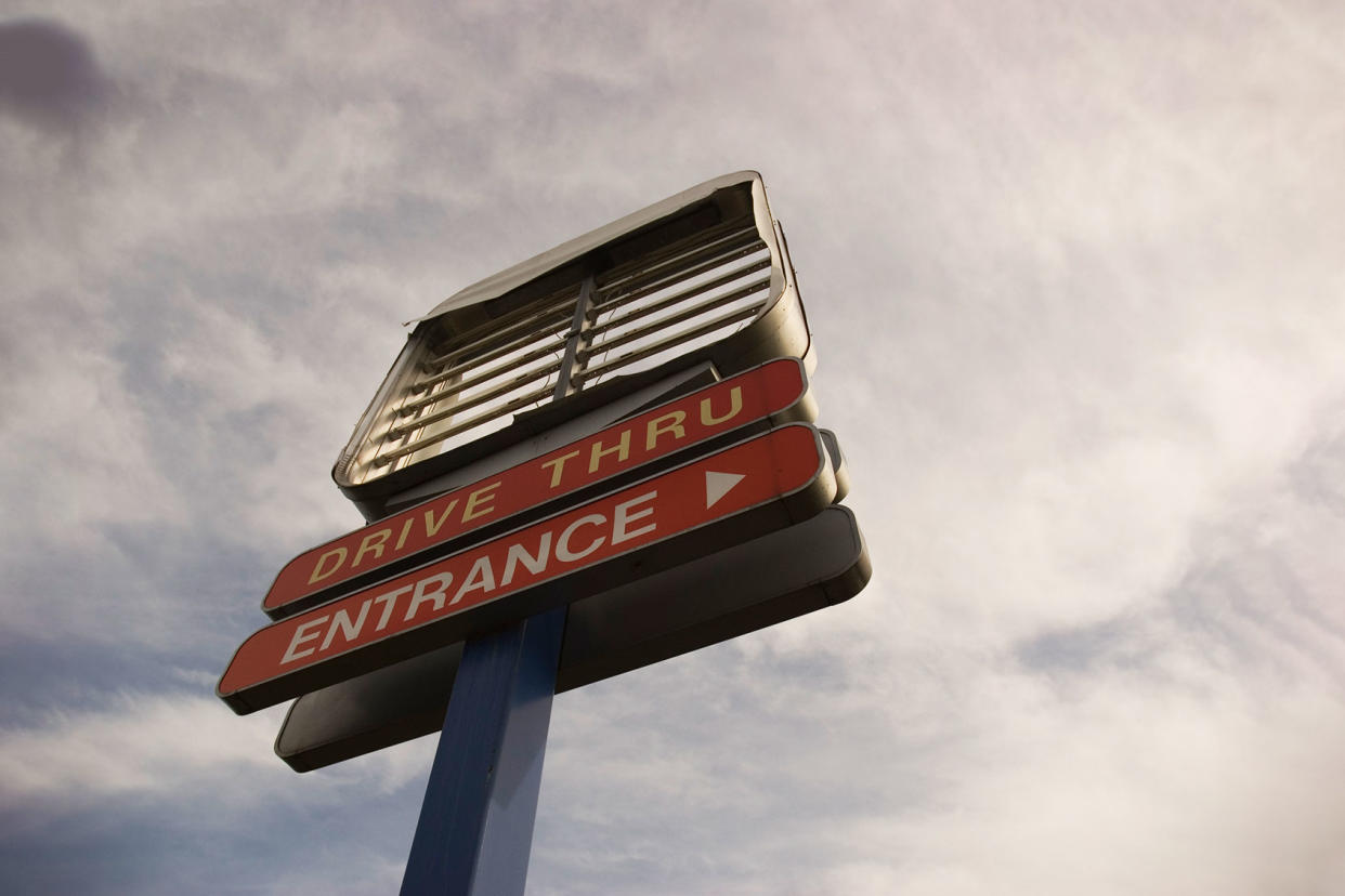 Sign at an abandoned fast food restaurant Getty Images/dickiedavis123