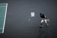 Russia's Daniil Medvedev returns the ball to Serbia's Novak Djokovic during the final match of the Paris Masters tennis tournament at the Accor Arena in Paris, Sunday, Nov.7, 2021. (AP Photo/Thibault Camus)