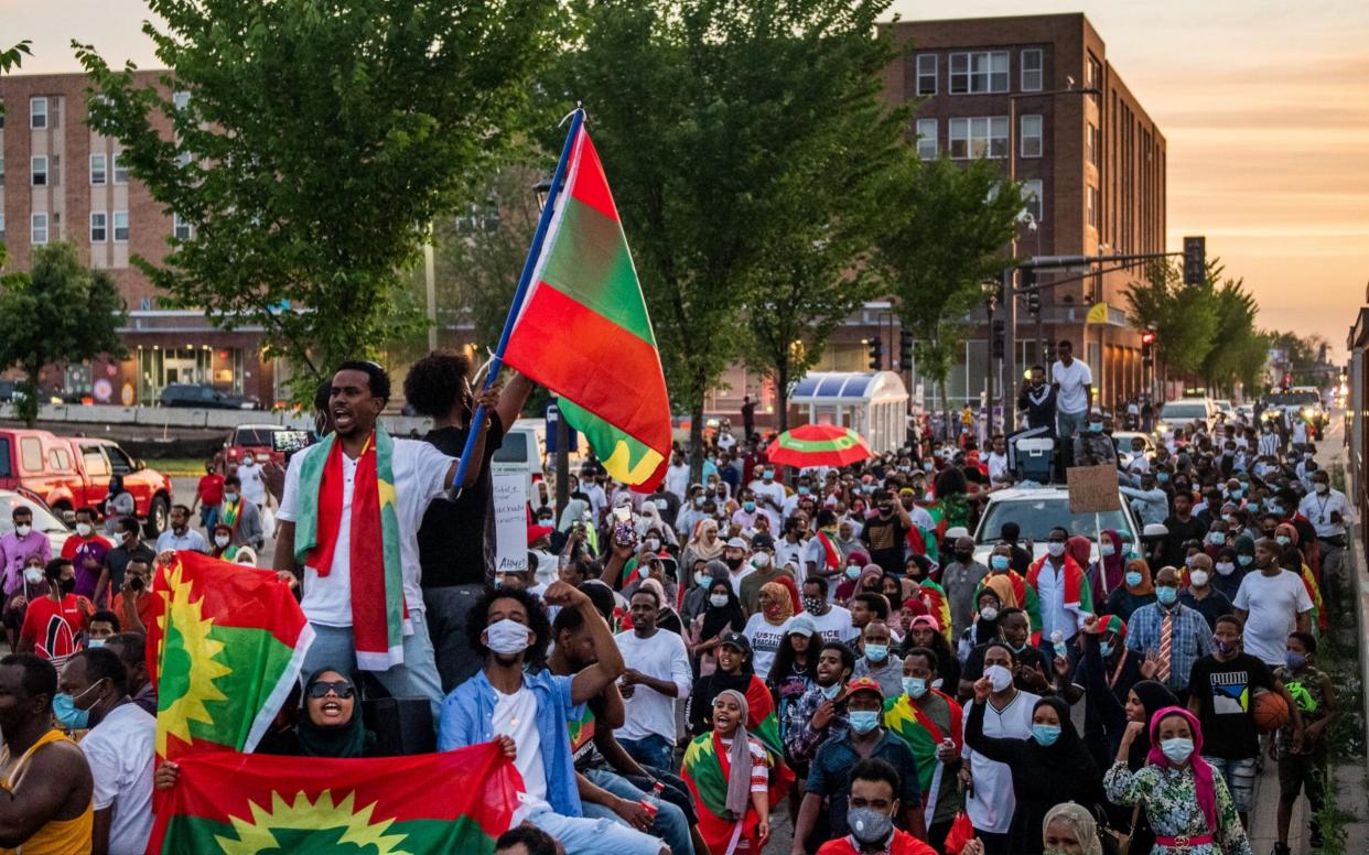 Protesters gather in Minnesota in large numbers following the death of popular Ethiopian singer and activist Hachalu Hundessa - Brandon Bell/Getty Images North America
