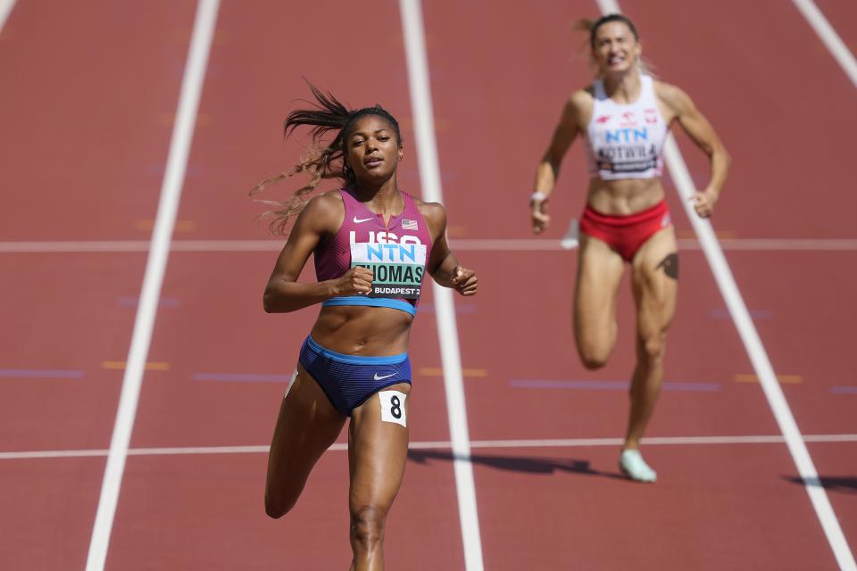 Gabrielle Thomas, of the United States wins in the Women's 200-meters heat during the World Athletics Championships in Budapest, Hungary, Wednesday, Aug. 23, 2023. (AP Photo/Martin Meissner)