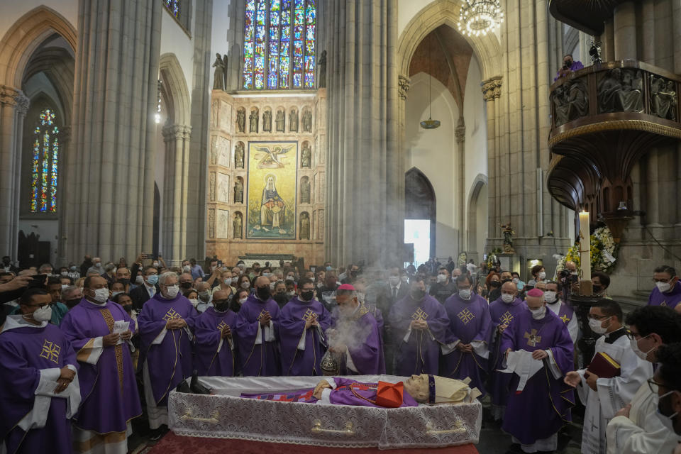 Clergy attend the funeral Mass for Cardinal Claudio Hummes at the Cathedral in Sao Paulo, Brazil, Tuesday, July 5, 2022. Hummes, the Brazilian Catholic cardinal who inspired Pope Francis to pick his name after the 2013 conclave, died on Monday at the age of 87. He was one of the country's main religious leaders and a strong advocate for the poor. (AP Photo/Andre Penner)