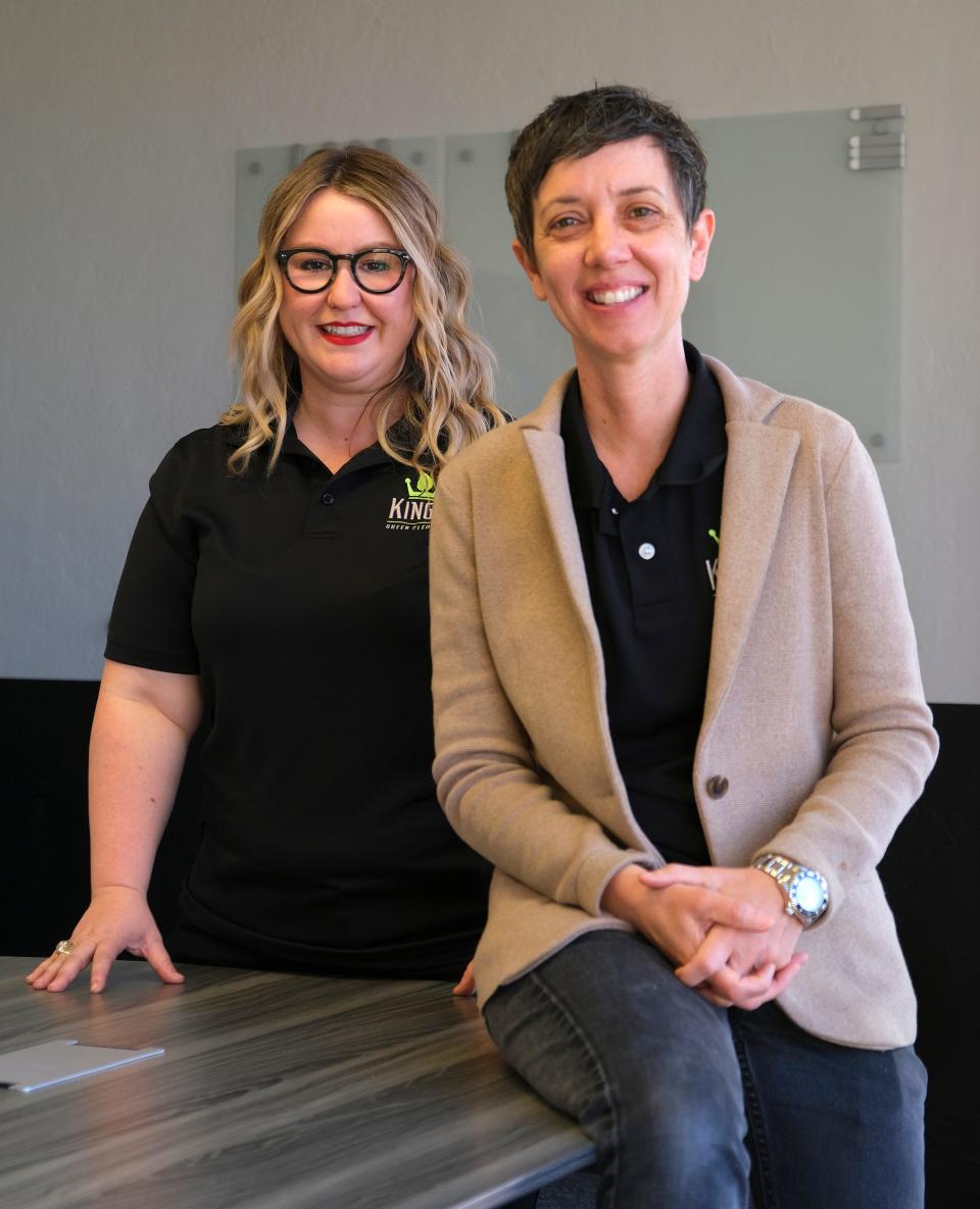 OUTLOOK: The owners of King's Green Cleaning, Amanda, left, and Amy King in their downtown office Monday, March 28, 2022. 