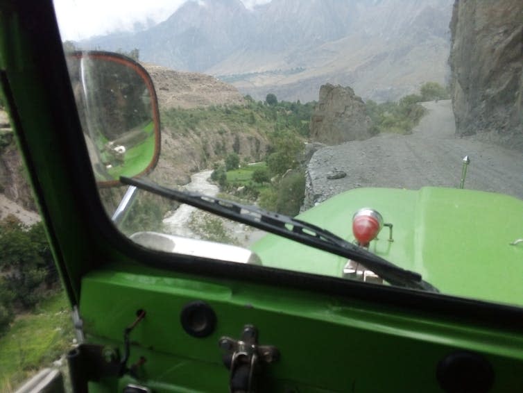 A view from a car on a steep mountainside.