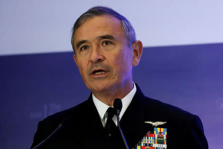 FILE PHOTO: U.S. Navy Admiral Harry Harris Jr, head of the Pacific Command, speaks at a Fullerton Lecture on "Challenges, Opportunities and Innovation in the Indo-Asia-Pacific", in Singapore October 17, 2017. REUTERS/Edgar Su/File Photo