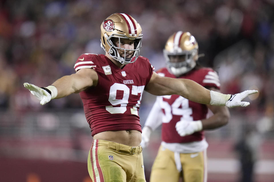 San Francisco 49ers defensive end Nick Bosa (97) celebrates after making a tackle against the Los Angeles Chargers during the second half of an NFL football game in Santa Clara, Calif., Sunday, Nov. 13, 2022. (AP Photo/Godofredo A. Vásquez)
