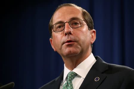 U.S. Secretary of Health and Human Services (HHS) Alex Azar addresses a news conference to announce a nation-wide health care fraud and opioid enforcement action, at the Justice Department in Washington, U.S. June 28, 2018. REUTERS/Jonathan Ernst